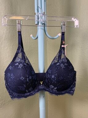 Victoria's Secret Navy Lace Underwire Bra with Gold V accent.